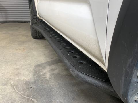 Step Edition Rock Slider For 24-Present Toyota Tacoma/Double Cab Short Bed W/ No Kick Out/Yes (Bed Liner)/Powdercoat Cali Raised LED
