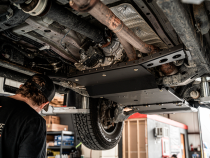 2005-2015 Toyota Tacoma Transfer Case Skid Plate - Aluminum Powercoat Black Cali Raised LED